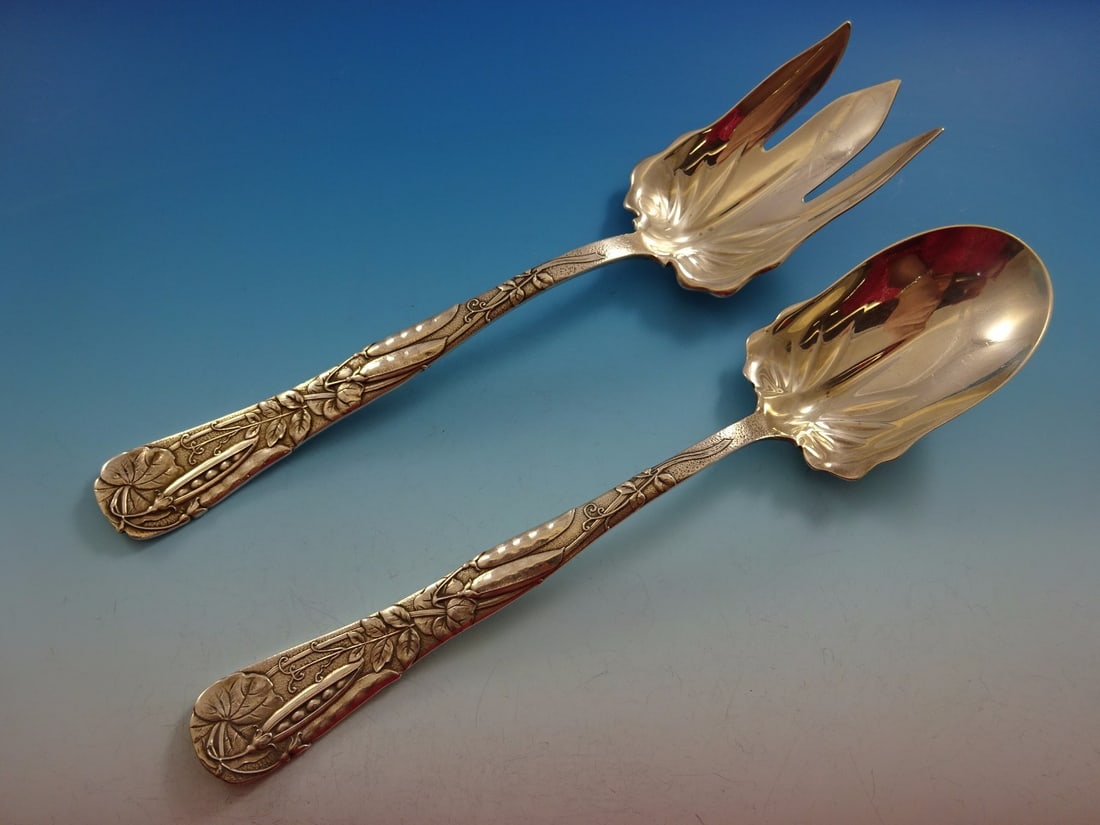 Tiffany & Co. Vine Sterling Silver Salad Serving Set 2pc 10": Tiffany & Co. Vine Sterling Silver Salad Serving Set 2pc 10" Enhance your dining experience with this exquisite 2-piece salad serving set from Tiffany & Co. The set, crafted in sterling silver, featur