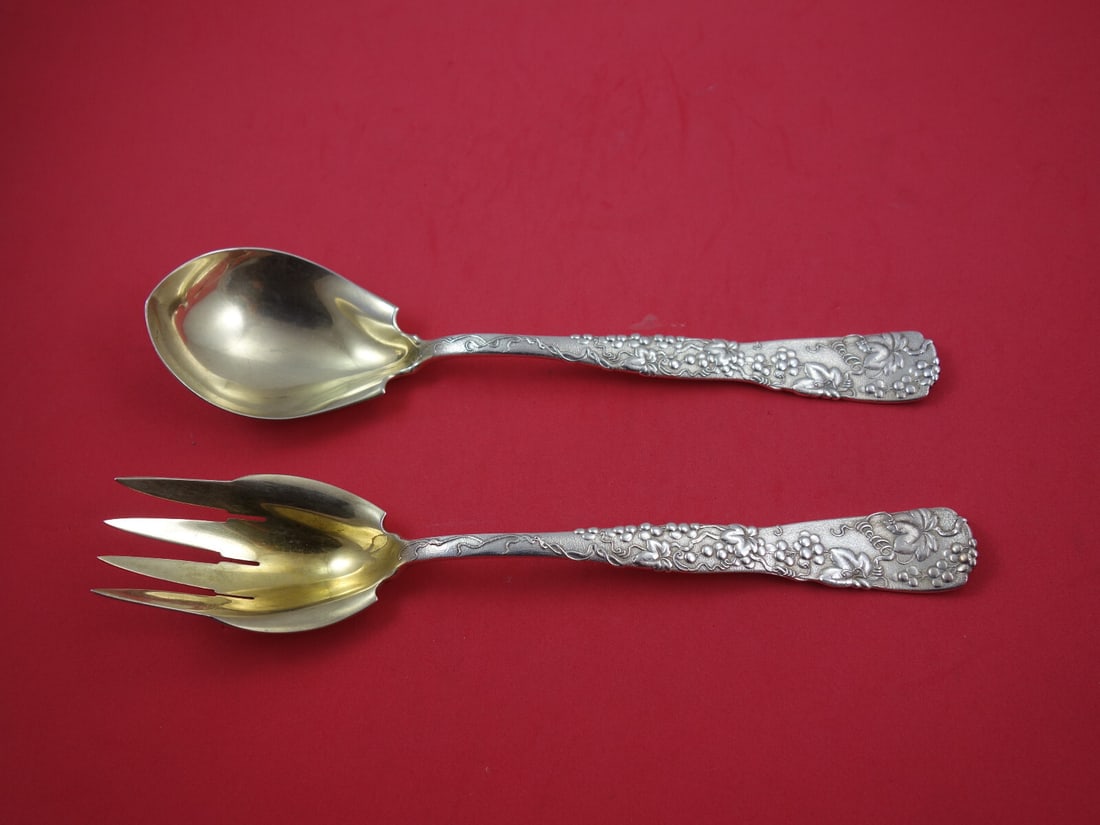 Tiffany & Co. Vine Sterling Silver Salad Set 10.25" Grape Motif: Tiffany & Co. Vine Sterling Silver Salad Set 10.25" Grape Motif Elevate your dining experience with this exquisite salad set from Tiffany & Co., featuring the iconic Vine pattern. Crafted from high-qu