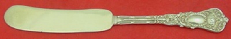 Durgin Empire Sterling Silver Butter Spreader 6 3/8 Inch Flat Handle: Durgin Empire Sterling Silver Butter Spreader 6 3/8 Inch Flat Handle This exquisite butter spreader features a flat handle and is crafted from sterling silver in the elegant Empire pattern by Durgin. 