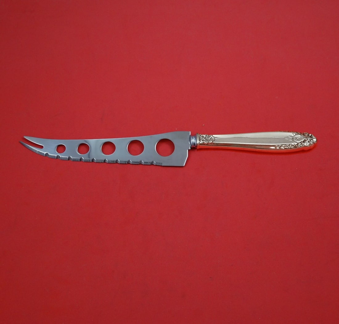 International Prelude Sterling Silver Large Charcuterie Knife 9 3/4": International Prelude Sterling Silver Large Charcuterie Knife 9 3/4" Elevate your entertaining with this exquisite large charcuterie knife from the Prelude pattern by International. Measuring 9 3/4" i