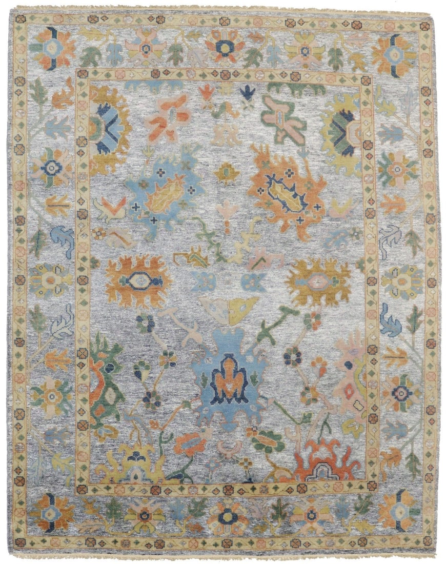 Muted Wool Floral Area Rug Hand-Knotted Oushak Design 8x10 Feet: Muted Wool Floral Area Rug Hand-Knotted Oushak Design 8x10 Feet This handmade Oushak-style rug features a floral pattern in muted shades of silver, green, blue, gold, and beige. Crafted from colorfast