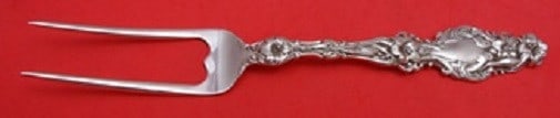 Whiting Lily Sterling Silver Custom Serving Fork 6 3/4 inches: Whiting Lily Sterling Silver Custom Serving Fork 6 3/4 inches This exquisite serving fork is crafted from high-quality sterling silver and features the elegant "Lily" pattern by Whiting. Measuring 6 3