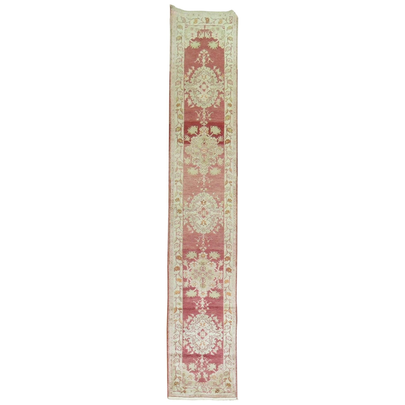 Mid 20th Century Turkish Wool Runner Red Hand-Knotted 2'1 x 11'9": Mid 20th Century Turkish Wool Runner Red Hand-Knotted 2'1 x 11'9" This mid-20th century Turkish runner features a vibrant red field with an all-over repetitive medallion design. Hand-knotted from wool