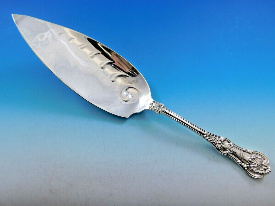 Tiffany & Co English King Sterling Silver Fish Server 12" Elegant Design: Tiffany & Co English King Sterling Silver Fish Server 12" Elegant Design This exquisite 12" fish server from Tiffany & Co. features the classic English King pattern, first introduced in 1885. Crafted 