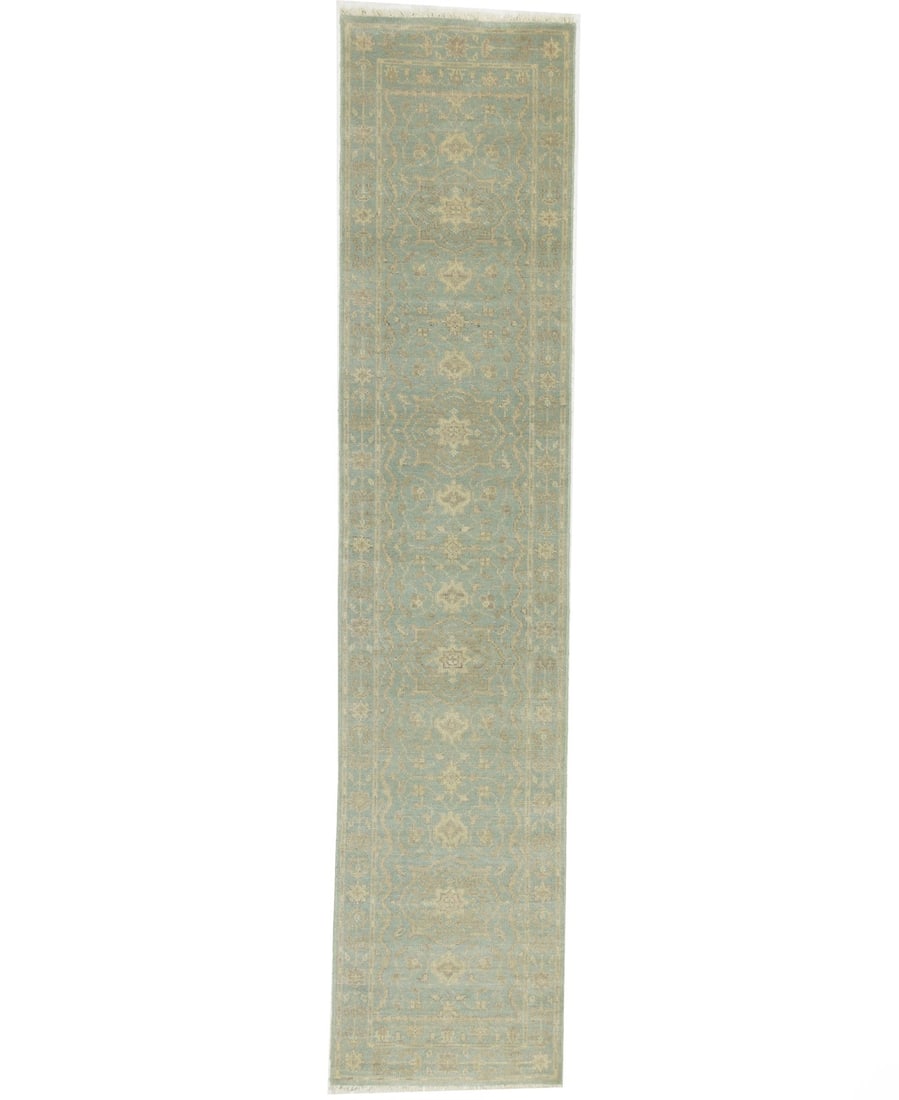 Hand Knotted Wool Floral Runner Rug 2'7 x 11'11: Hand Knotted Wool Floral Runner Rug 2'7 x 11'11 This handmade Oriental runner rug features a muted aqua blue floral pattern and is crafted from hand-knotted wool. With a transitional modern design, th