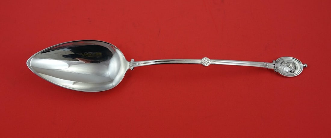 Wendt Medallion Sterling Silver 12 Inch Serving Spoon: Wendt Medallion Sterling Silver 12 Inch Serving Spoon This elegant 12" serving spoon from the Medallion pattern by Wendt is crafted from high-quality sterling silver. Its classic design features intri