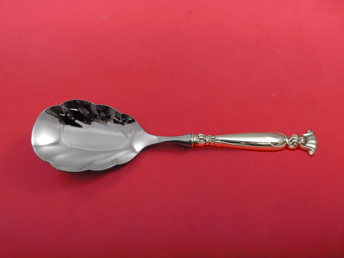 Wallace Romance of the Sea Sterling Silver Rice Spoon 10" Serving Piece: Wallace Romance of the Sea Sterling Silver Rice Spoon 10" Serving Piece This exquisite rice spoon from the Wallace "Romance of the Sea" pattern is a beautiful addition to any dining collection. Crafte