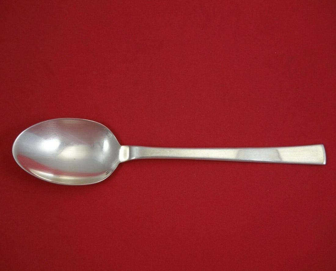 Christofle Vertigo Silverplate 10 Inch Vegetable Serving Spoon: Christofle Vertigo Silverplate 10 Inch Vegetable Serving Spoon Elevate your dining experience with this exquisite Vertigo Vegetable Serving Spoon by Christofle. Crafted from high-quality silverplate, 