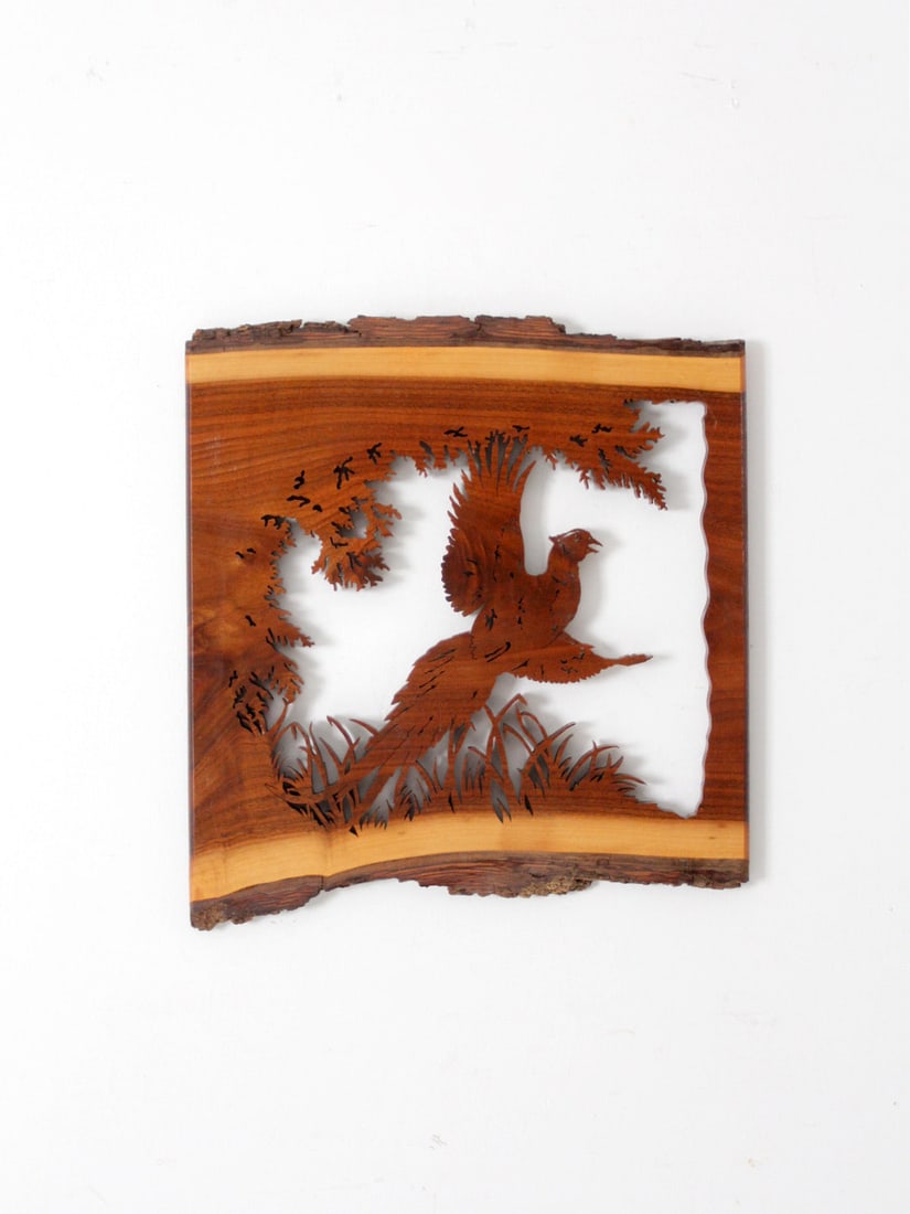 Vintage Natural Edge Wood Pheasant Wall Art 17.5 x 16: Vintage Natural Edge Wood Pheasant Wall Art 17.5 x 16 This stunning vintage wall hanging features an intricately cut pheasant design, skillfully crafted from a beautiful piece of natural-edge wood. Th