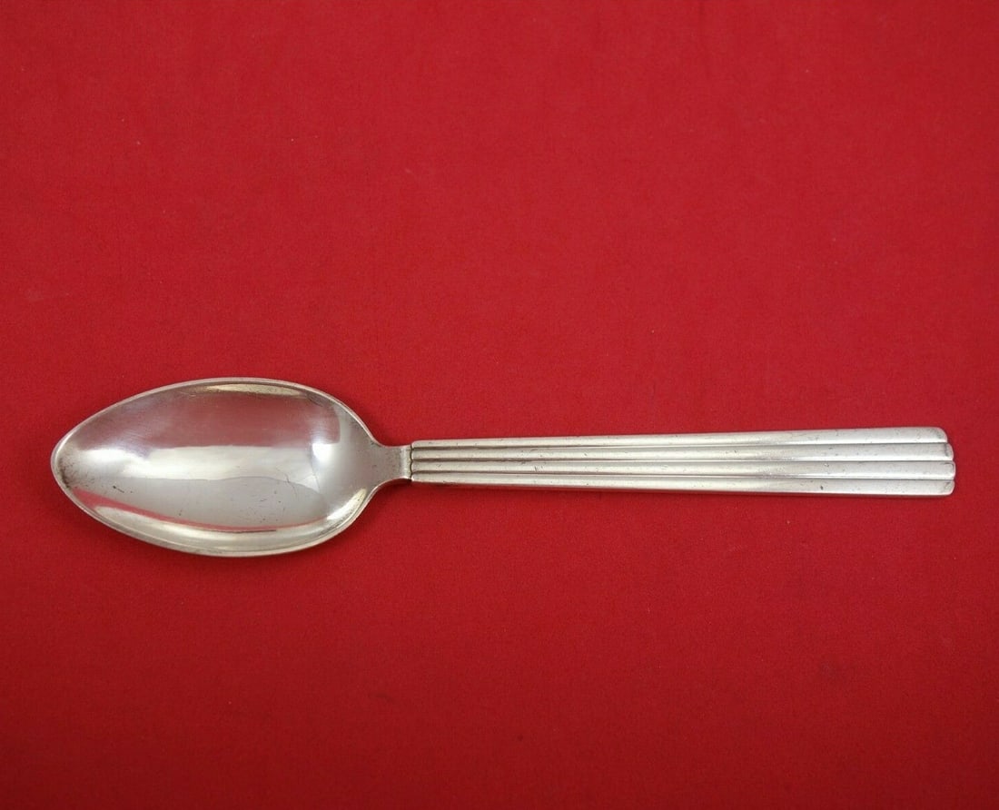 Georg Jensen Bernadotte Sterling Silver Child's Spoon Vintage 5 3/4": Georg Jensen Bernadotte Sterling Silver Child's Spoon Vintage 5 3/4" This vintage Bernadotte child's spoon by Georg Jensen is a beautifully crafted piece made of sterling silver. Measuring 5 3/4 inche