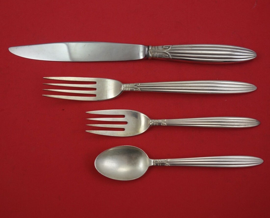 Reed & Barton Jubilee Sterling Silver 4-Piece Dinner Set: Reed & Barton Jubilee Sterling Silver 4-Piece Dinner Set This exquisite 4-piece dinner setting in the Jubilee pattern by Reed & Barton is crafted from high-quality sterling silver. The set includes a 