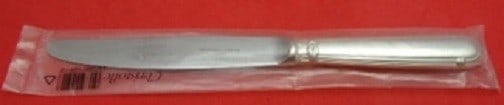 Christofle Oceana Sterling Silver Dinner Knife 9 3/4" with Felt Holder: Christofle Oceana Sterling Silver Dinner Knife 9 3/4" with Felt Holder Elevate your dining experience with this exquisite Oceana dinner knife by Christofle. Crafted from high-quality sterling silver, 