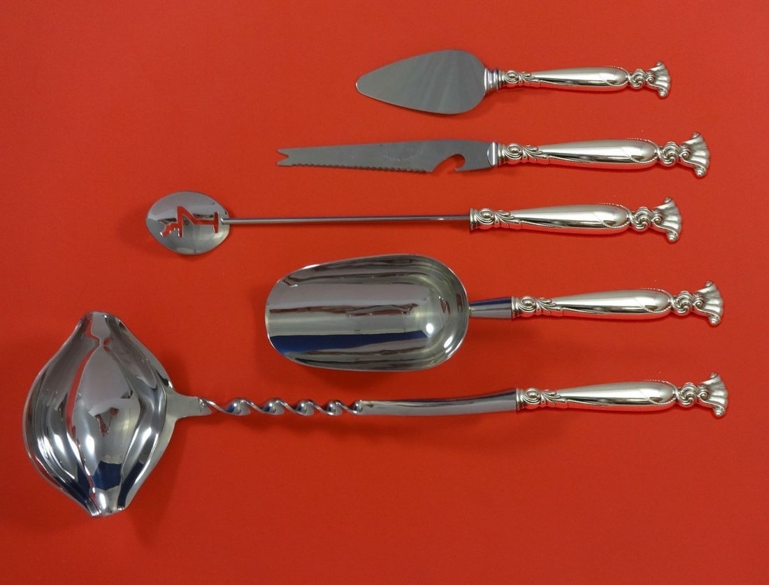 Wallace Romance of the Sea Sterling Silver 5pc Cocktail Party Set: Wallace Romance of the Sea Sterling Silver 5pc Cocktail Party Set Elevate your cocktail parties with the exquisite Romance of the Sea Hostess Set by Wallace. This custom-made 5-piece bar serving set f
