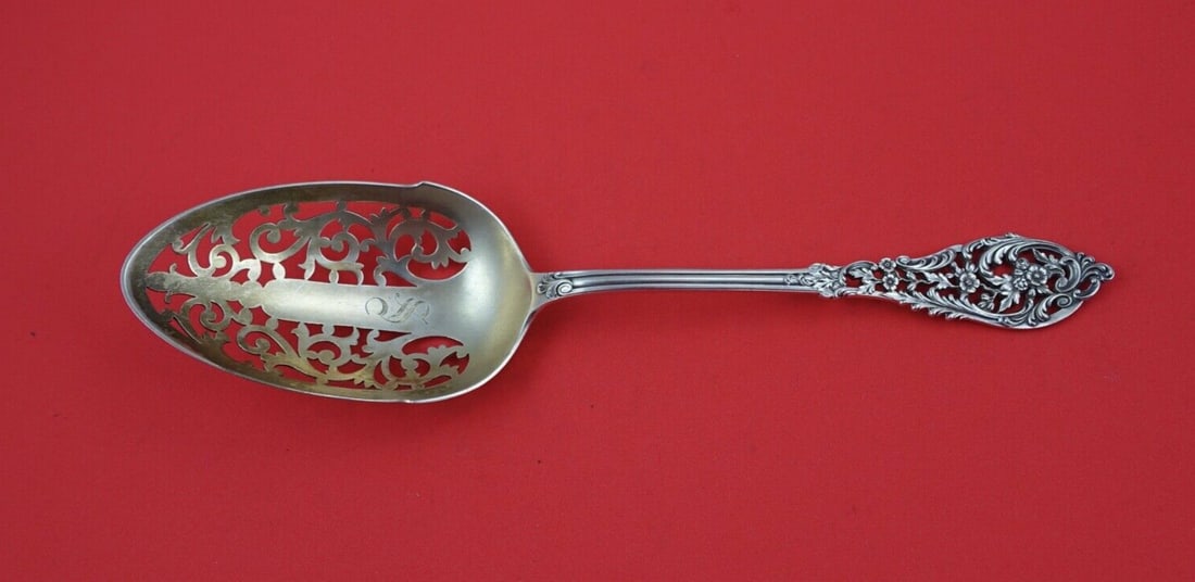 Dominick & Haff Trianon Pierced sterling silver ice spoon 9 1/8 gold washed: Dominick & Haff Trianon Pierced sterling silver ice spoon 9 1/8 gold washed Sterling silver ice spoon in the Trianon Pierced pattern by Dominick & Haff. It features a beautifully pierced bowl, gold wa