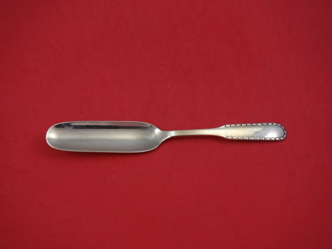 Georg Jensen Rope Sterling Silver Cheese Scoop 7 Inch: Georg Jensen Rope Sterling Silver Cheese Scoop 7 Inch Discover the elegance of the Rope pattern by Georg Jensen with this exquisite sterling silver cheese scoop. Measuring 7 inches, this piece showcas