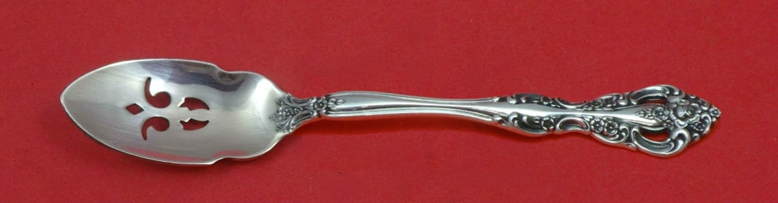 Oneida Sterling Silver Michelangelo Custom Olive Spoon 5 3/4 Inch: Oneida Sterling Silver Michelangelo Custom Olive Spoon 5 3/4 Inch This exquisite olive spoon features the elegant Michelangelo pattern by Oneida, crafted from high-quality sterling silver. Measuring 5
