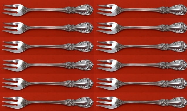 Reed and Barton Burgundy Sterling Silver Cocktail Fork Set 12 Pieces: Reed and Barton Burgundy Sterling Silver Cocktail Fork Set 12 Pieces Elevate your dining experience with this exquisite 12-piece cocktail fork set in the elegant Burgundy pattern by Reed & Barton. Eac
