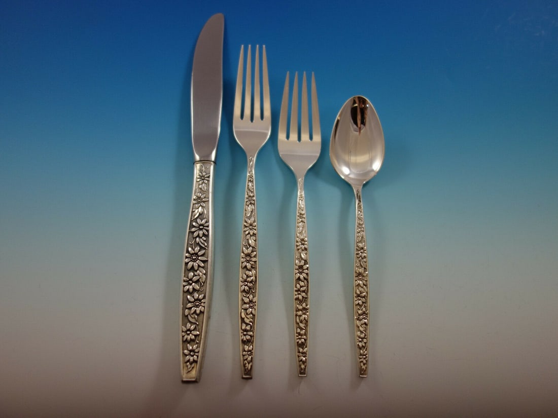 Towle Meadow Song Sterling Silver 4-Piece Place Setting: Towle Meadow Song Sterling Silver 4-Piece Place Setting Enhance your dining experience with this exquisite 4-piece place setting from Towle, crafted in sterling silver. This set features the elegant '