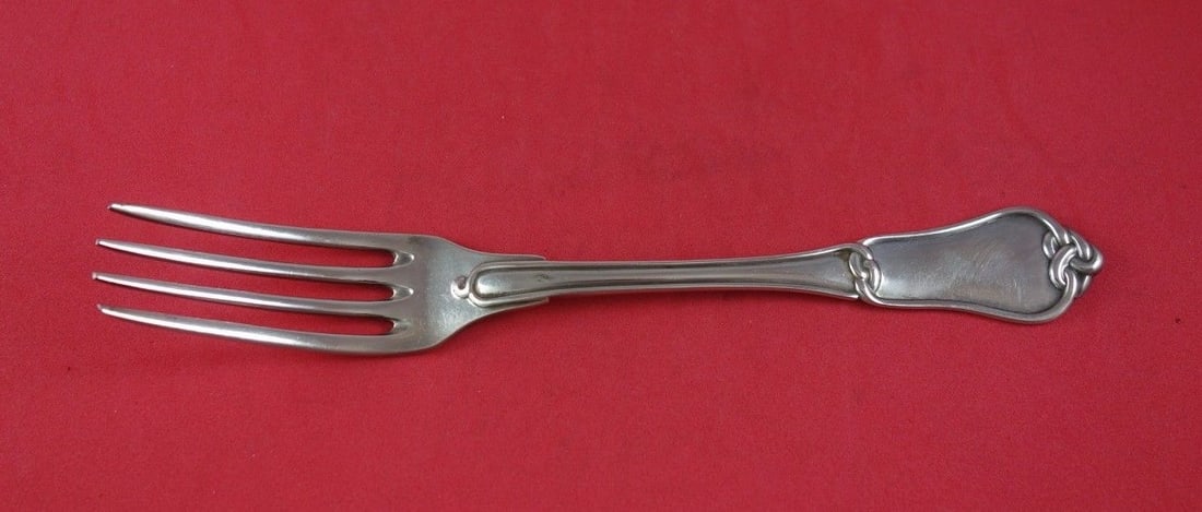 French Sterling Silver Gordian Knot Dinner Fork 8 3/8": French Sterling Silver Gordian Knot Dinner Fork 8 3/8" This exquisite dinner fork features the Gordian Knot pattern, also known as Noeud Gordien, crafted from high-quality sterling silver by French St