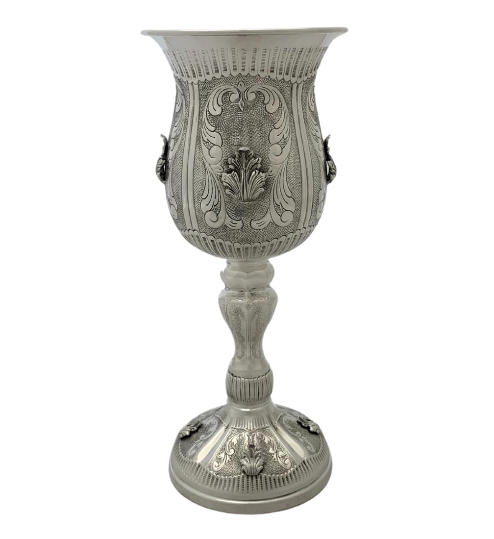 Handmade 925 Sterling Silver Eliyahu Cup with Chased Leaf Design: Handmade 925 Sterling Silver Eliyahu Cup with Chased Leaf Design This exquisite Eliyahu Cup is handcrafted from fine 925 sterling silver, showcasing a unique chased leaf applique swirl design. The cup