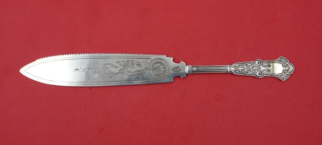 Whiting Alhambra Sterling Silver Cake Saw 9 3/4 Bright-Cut Serrated: Whiting Alhambra Sterling Silver Cake Saw 9 3/4 Bright-Cut Serrated This exquisite cake saw from the Alhambra pattern by Whiting showcases a bright-cut design with a serrated edge, ideal for serving d