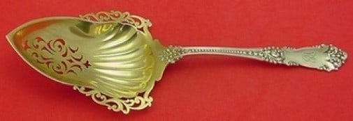 Reed & Barton La Marquise Sterling Silver Goldwashed Ice Spoon 10 1/4": Reed & Barton La Marquise Sterling Silver Goldwashed Ice Spoon 10 1/4" This exquisite ice spoon from the La Marquise pattern by Reed & Barton is crafted from high-quality sterling silver. Featuring a 