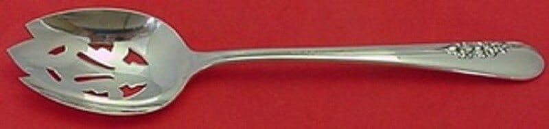 International Blossom Time Sterling Silver Pierced Serving Spoon 8 1/2: International Blossom Time Sterling Silver Pierced Serving Spoon 8 1/2 Sterling silver serving spoon in the Blossom Time pattern by International. This pierced slotted spoon is 8 1/2 inches long, not 
