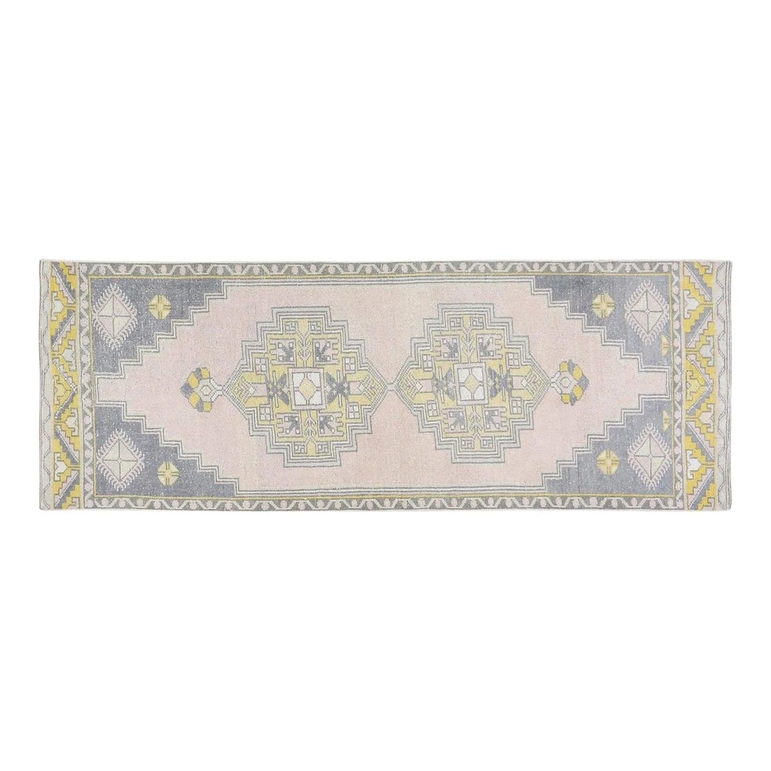 2'7" x 7'2" Anatolian Wool Hand Knotted Vintage Turkish Rug: 2'7" x 7'2" Anatolian Wool Hand Knotted Vintage Turkish Rug This vintage Turkish Anatolian rug is hand knotted from wool and features natural colors with a pink hue. The rug displays traditional craft