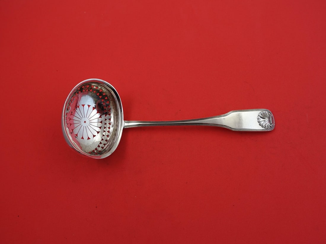 Danish Sterling Silver Sugar Sifter 1907 Serving Piece 7 1/4": Danish Sterling Silver Sugar Sifter 1907 Serving Piece 7 1/4" This exquisite Danish Sterling Silver Sugar Sifter, crafted in 1907, features the elegant pattern of Danish Sterling by various makers. Me