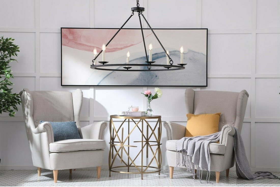 Living District Maine 6-Light Black Wagon Wheel Chandelier 36 inch: Living District Maine 6-Light Black Wagon Wheel Chandelier 36 inch This black farmhouse-style wagon wheel chandelier features a robust metal frame with a round design and accommodates six lights. The 