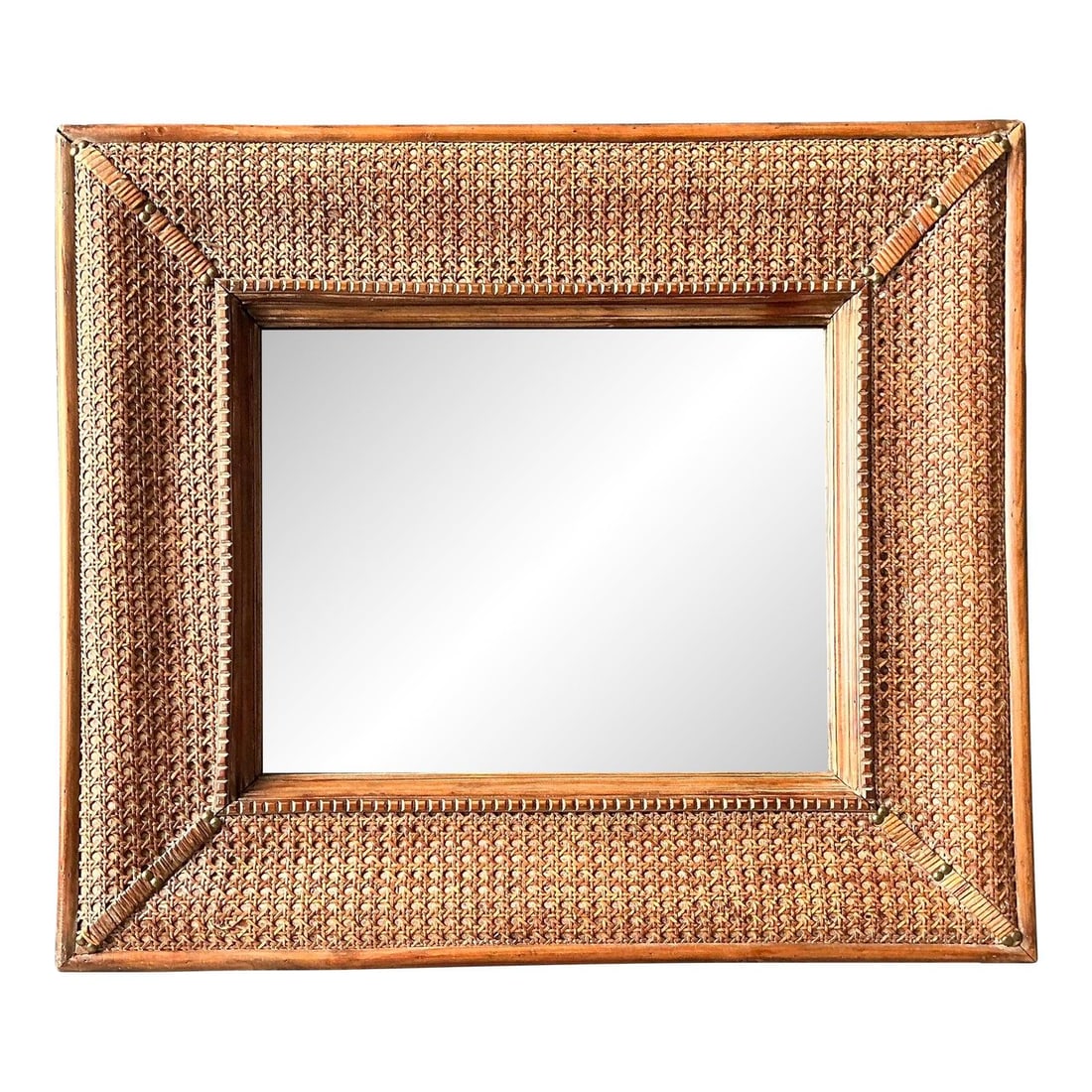 Rattan Wrapped Wall Mirror with Beaded Edge: Rattan Wrapped Wall Mirror with Beaded Edge This vintage wall mirror features a wide frame expertly wrapped in natural woven cane, showcasing intricate canework that embodies both Hollywood Regency an