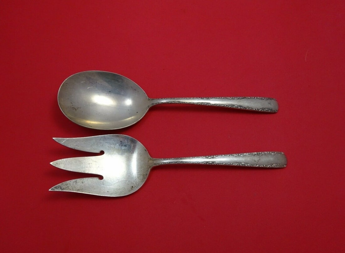 Gorham Camellia Sterling Silver Salad Serving Set 2pc 8 7/8": Gorham Camellia Sterling Silver Salad Serving Set 2pc 8 7/8" Elevate your dining experience with the exquisite Camellia salad serving set by Gorham. This 2-piece set, crafted from sterling silver, fea