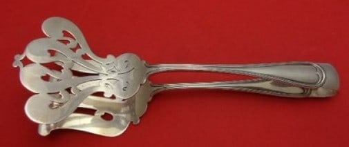 Durgin English Antique Tip Sterling Silver Asparagus Tong 10.5" Monogrammed: Durgin English Antique Tip Sterling Silver Asparagus Tong 10.5" Monogrammed This exquisite asparagus tong features the elegant English Antique Tip pattern by Durgin. Measuring 10 1/2 inches in length,