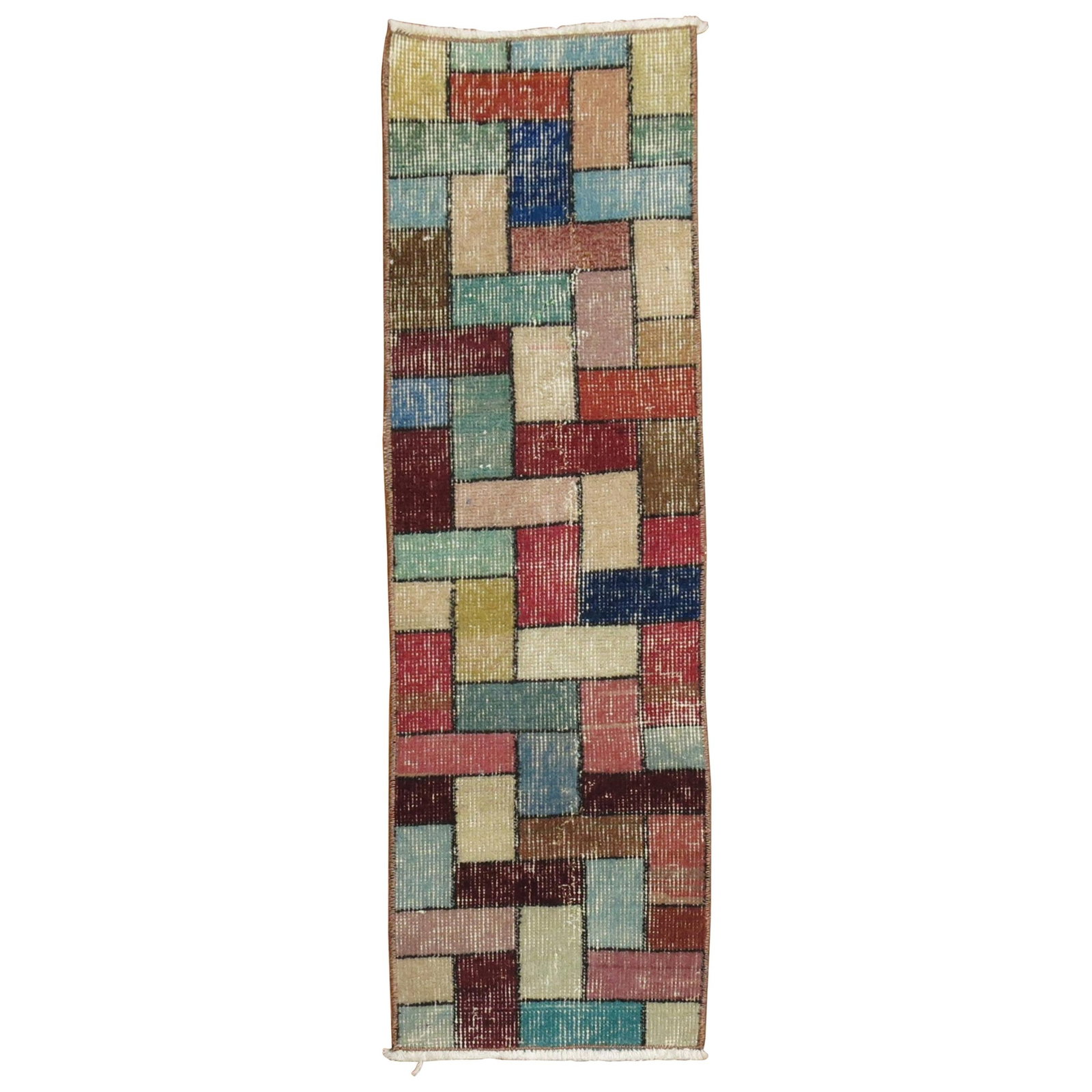 Mid Century Turkish Wool Hand Woven Narrow Runner: Mid Century Turkish Wool Hand Woven Narrow Runner This vintage Turkish runner features a vibrant, mid-century modern design with a deco-inspired mosaic pattern reminiscent of a Tetris game. Hand-woven