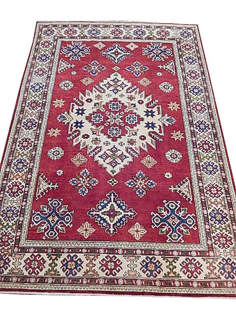 Handmade 5.6 x 7.11 Kazak Wool Rug from Pakistan: Handmade 5.6 x 7.11 Kazak Wool Rug from Pakistan Free continental US Shipping Enhance your space with this exquisite 5.6 x 7.11 New Kazak Rug, handwoven from high-quality wool in Pakistan and Afghanis