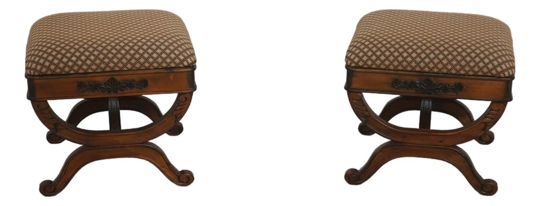 Pair Regency Walnut X Base Foot Stools: Pair Regency Walnut X Base Foot Stools This pair of Regency style foot stools features a walnut finish and finely carved details, exemplifying high-quality construction. Each bench is designed with an