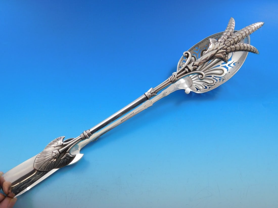 Gorham Lotus Sterling Silver Salad Tong 10.5 Eagle Claw Design: Gorham Lotus Sterling Silver Salad Tong 10.5 Eagle Claw Design This exquisite salad tong from the Lotus pattern by Gorham is crafted from high-quality sterling silver. Measuring 10 1/2" in length, it 