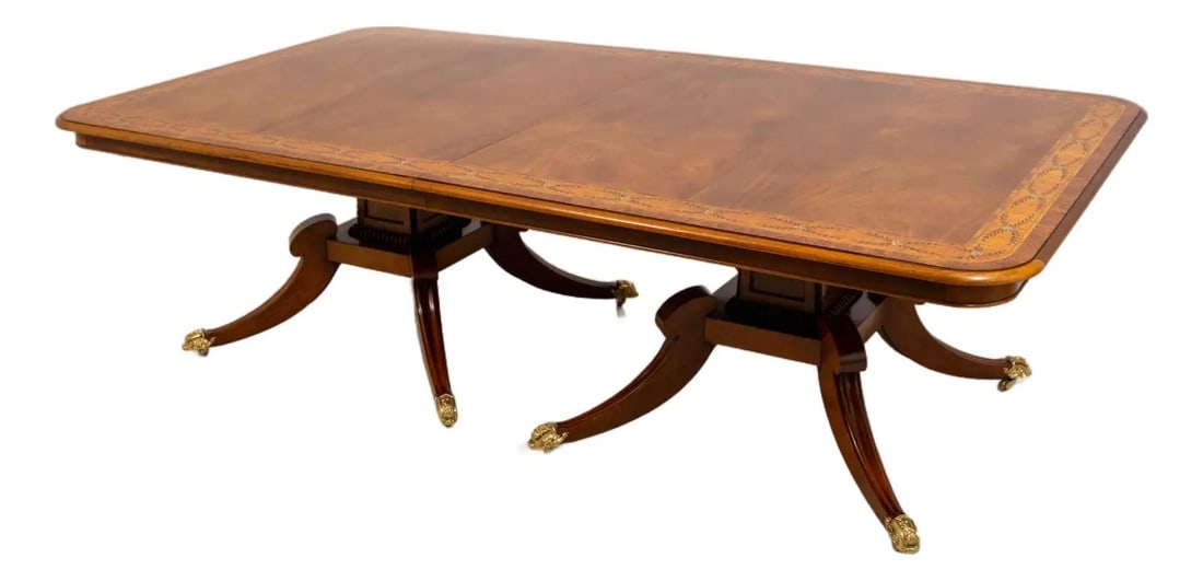 Hand-Painted Burl Walnut Regency Dining Table with Brass Capped Feet: Hand-Painted Burl Walnut Regency Dining Table with Brass Capped Feet This English Adams dining room table features a hand-painted decorated border and a burl walnut outer edge, showcasing Regency Dunc