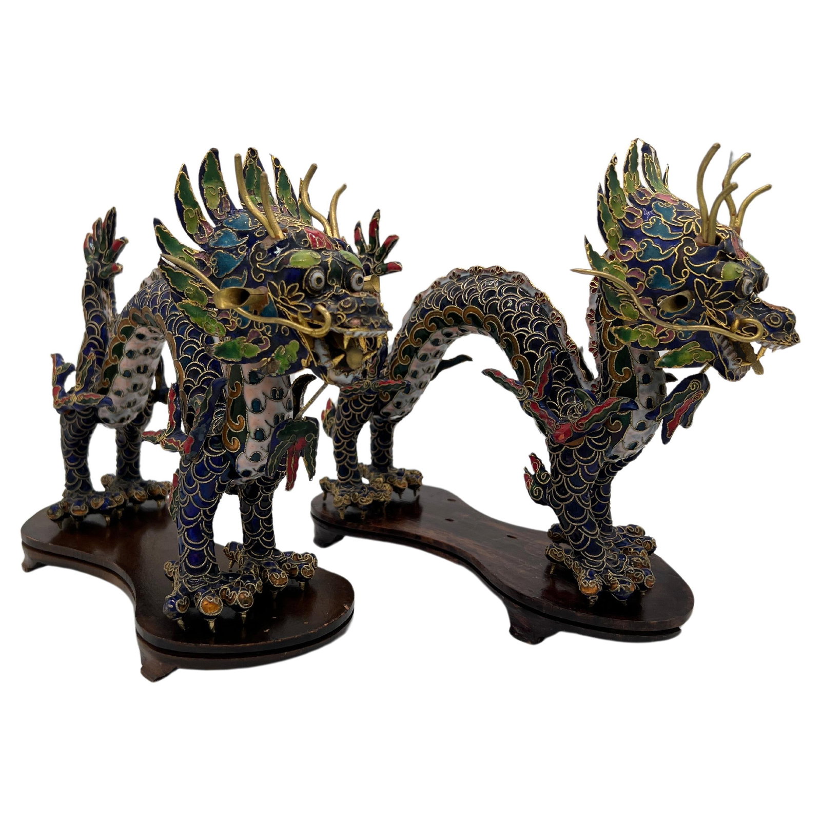 Set of 2 Chinese Export Cloisonne Dragon Figurines with Stands: Set of 2 Chinese Export Cloisonne Dragon Figurines with Stands This exquisite pair of Chinese export cloisonne dragon figurines on stands showcases intricate craftsmanship and vibrant colors. Each dra