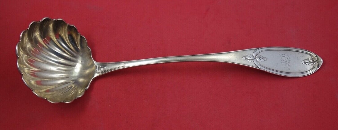 Olive Pattern Sterling Silver Soup Ladle 14 Inch Shell Bowl by Various Makers: Olive Pattern Sterling Silver Soup Ladle 14 Inch Shell Bowl by Various Makers This exquisite soup ladle features a classic shell bowl design and is crafted from high-quality sterling silver. The ladle