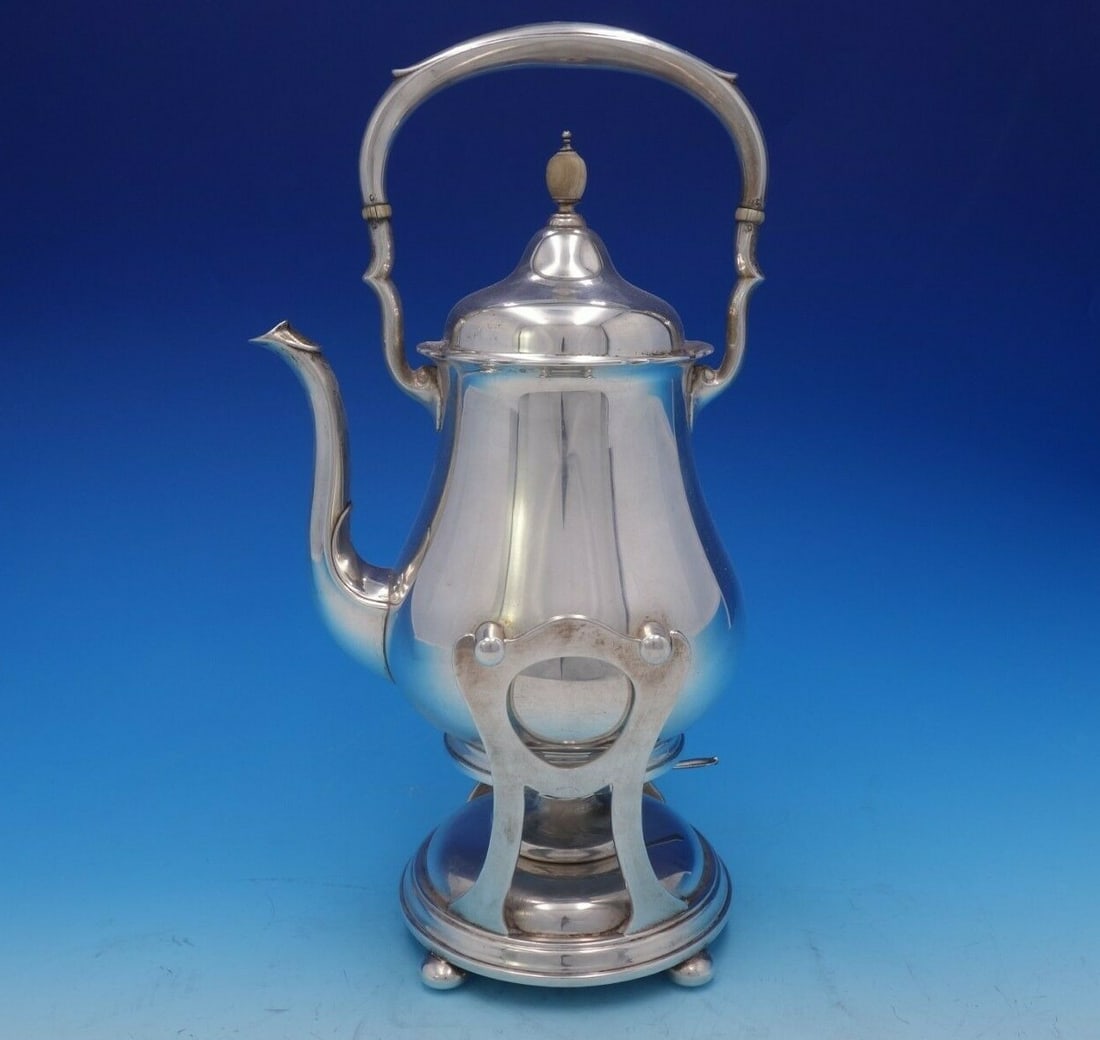 International Sterling Silver Brandon Kettle on Stand with Burner SC506: International Sterling Silver Brandon Kettle on Stand with Burner SC506 This exquisite Brandon kettle, crafted by International Sterling, is a stunning addition to any collection. Dating from 1900-194