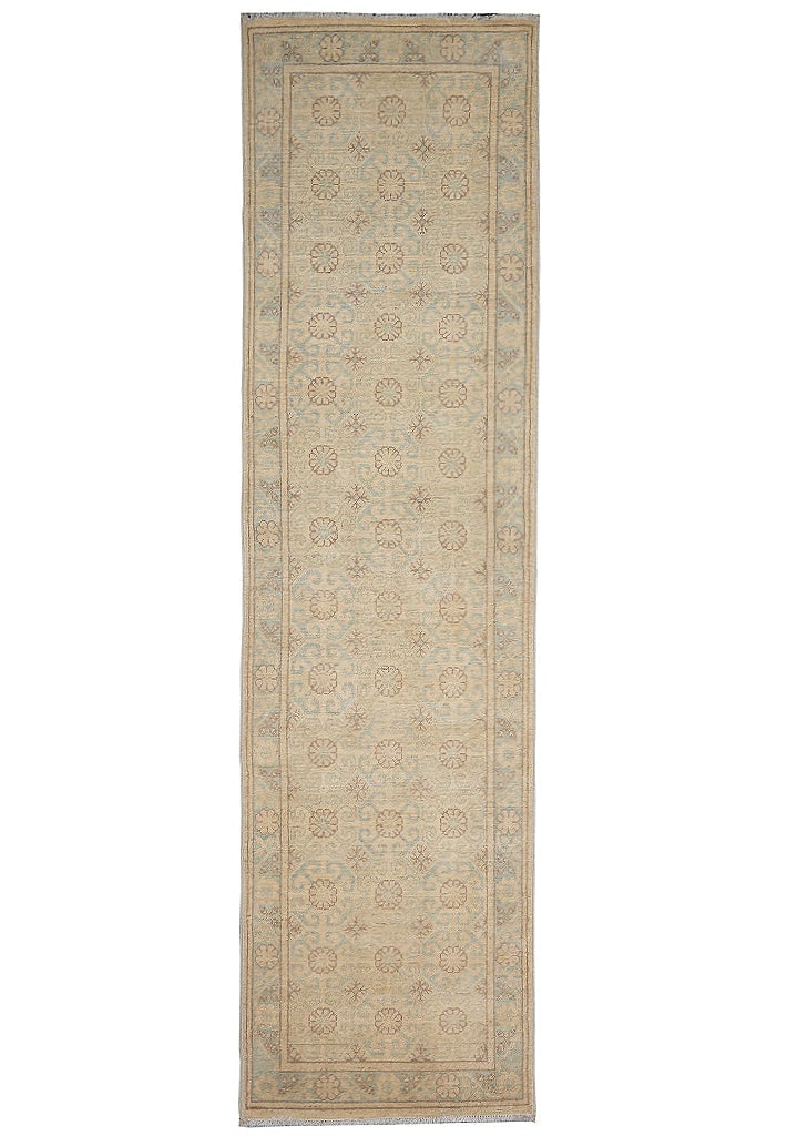 2.7 x 10 Kerman Hand-Knotted Natural Wool Runner Red Field Persian Rug: 2.7 x 10 Kerman Hand-Knotted Natural Wool Runner Red Field Persian Rug Free continental US Shipping This semi-antique runner rug is hand-knotted from high-quality natural wool and features an elegant 