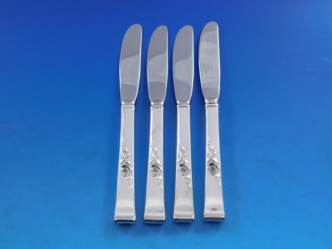 Reed and Barton Classic Rose Sterling Silver Butter Spreader Set 4 pcs: Reed and Barton Classic Rose Sterling Silver Butter Spreader Set 4 pcs Enhance your dining experience with this elegant set of four butter spreaders from Reed & Barton, featuring the exquisite Classic