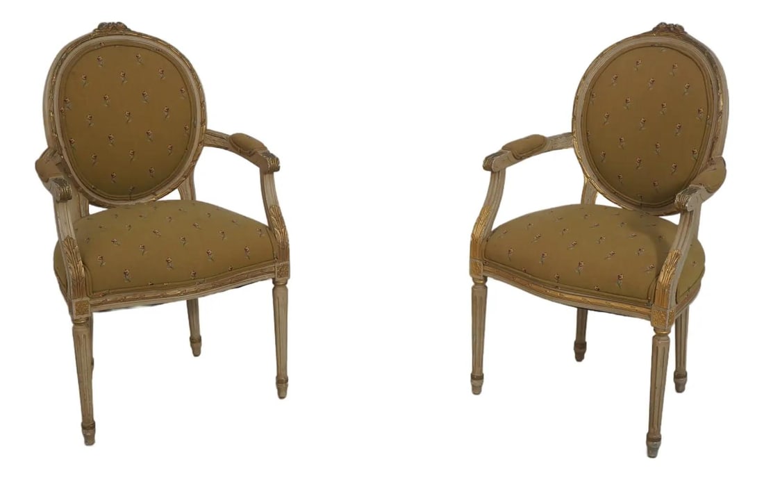 Set of Two French Style Painted Fauteuil Armchairs with Carved Wood Frames: Set of Two French Style Painted Fauteuil Armchairs with Carved Wood Frames This pair of Louis XVI style painted fauteuil armchairs features finely carved details and a hand-carved wooden frame. The ch
