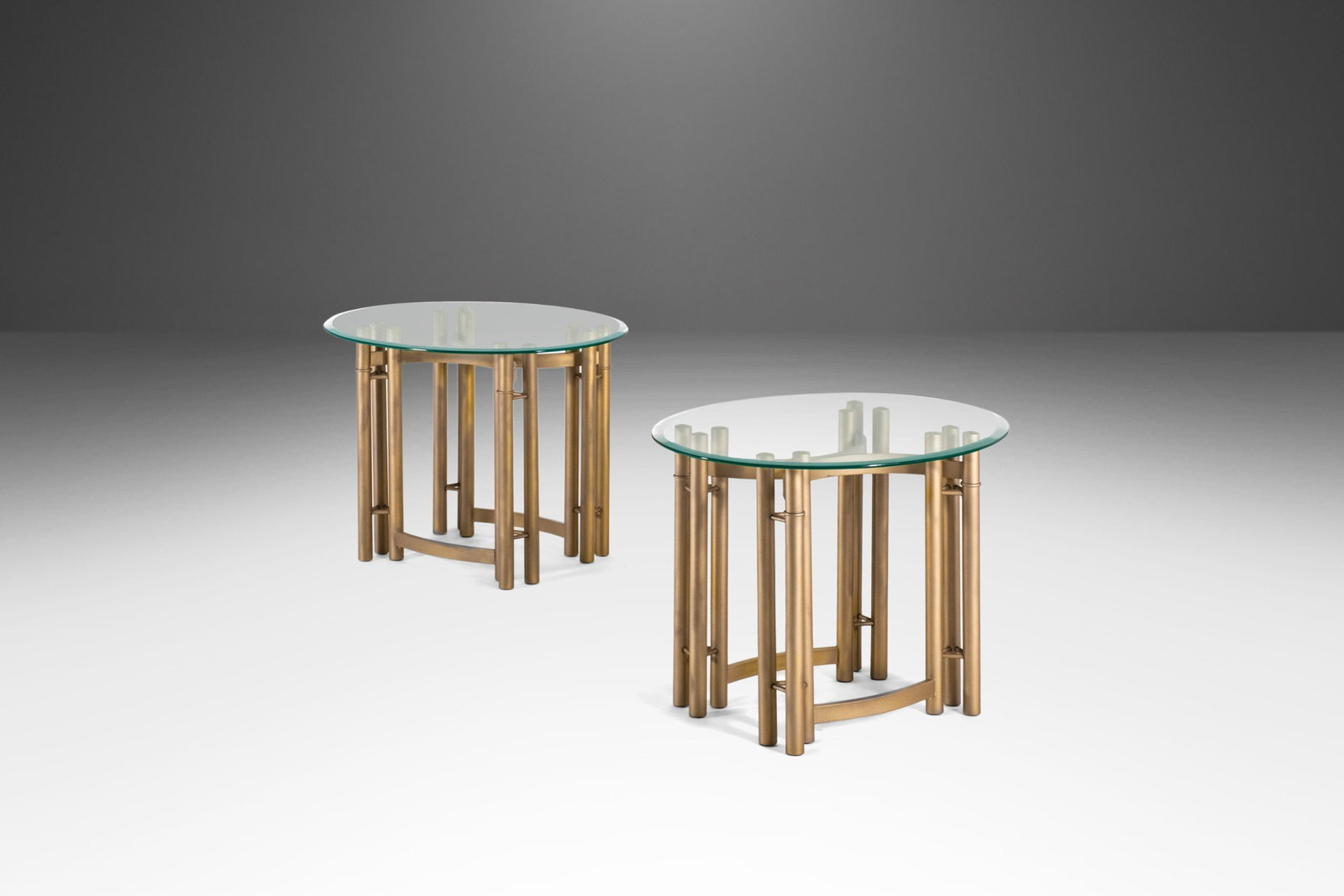 Hollywood Regency Set of 2 Gold Tubular End Tables with Glass Tops: Hollywood Regency Set of 2 Gold Tubular End Tables with Glass Tops This exquisite set of two tubular end tables embodies the luxurious style of Hollywood Regency. Finished in a stunning gold flake pow