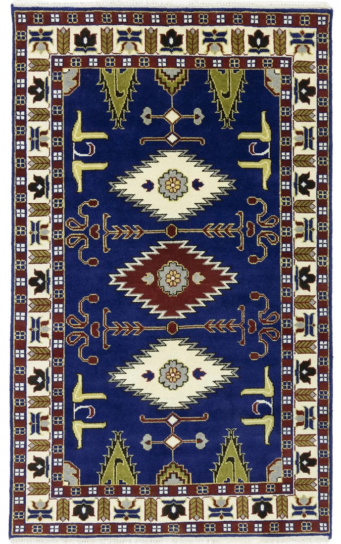 Hand-Knotted Kazak Wool Rug Geometric Navy Blue 4'10 x 7'11: Hand-Knotted Kazak Wool Rug Geometric Navy Blue 4'10 x 7'11 This handmade Kazak area rug features a navy blue geometric pattern with accents of cream, red, pastel yellow, khaki, and dark brown. Crafte