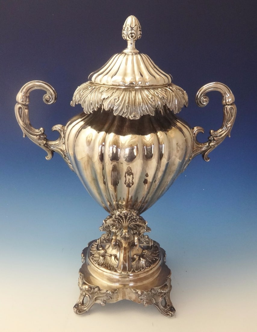 Victorian English Silverplate Hot Water Urn with Leaf Scroll Motif 20" Tall: Victorian English Silverplate Hot Water Urn with Leaf Scroll Motif 20" Tall This exquisite English silverplate hot water urn, dating back to the 1880s, showcases a stunning leaf and scrollwork motif a