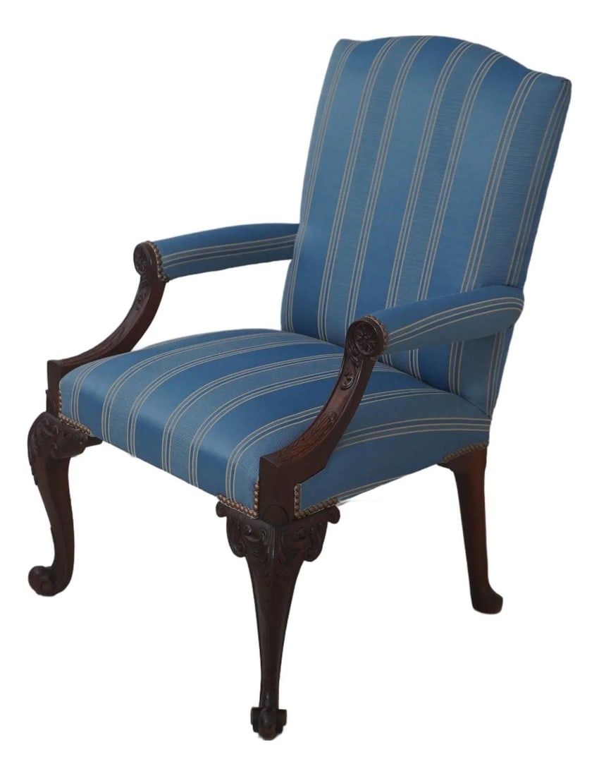 Baker Mahogany Georgian Library Armchair: Baker Mahogany Georgian Library Armchair This Georgian style library chair features finely carved mahogany construction, showcasing high-quality craftsmanship and elegant scrolled legs. The chair has 