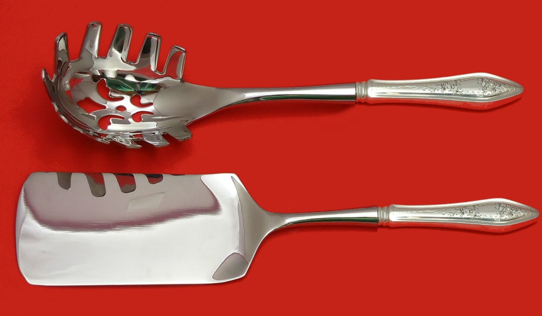 Towle Sterling Silver Custom 2PC Italian Pasta Server Set: Towle Sterling Silver Custom 2PC Italian Pasta Server Set This exquisite 2-piece Italian pasta serving set features custom-made hollow handles crafted from sterling silver, with durable stainless stee