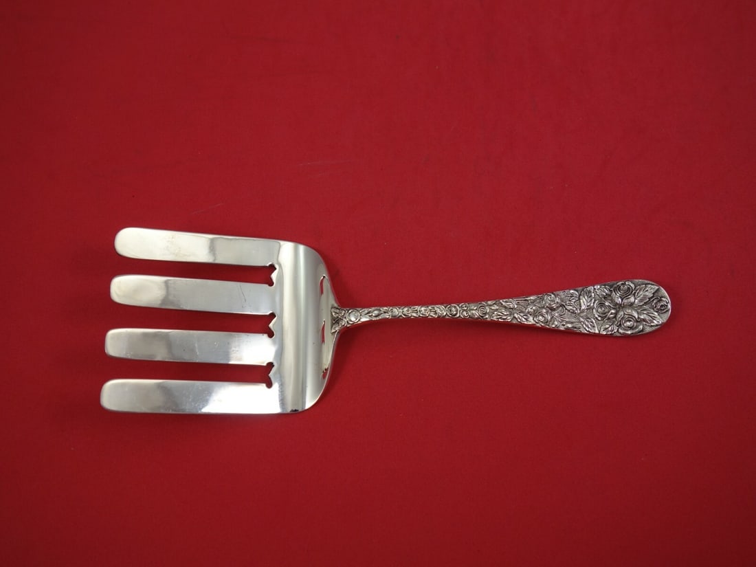 Schofield Baltimore Rose Sterling Silver Asparagus Serving Fork 7 3/4": Schofield Baltimore Rose Sterling Silver Asparagus Serving Fork 7 3/4" This exquisite asparagus serving fork features the elegant Baltimore Rose pattern by Schofield. Crafted from high-quality sterlin